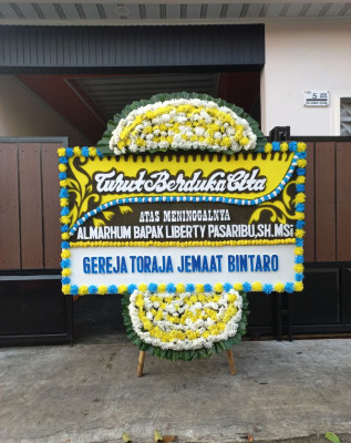 Papan Bunga Duka di Babalan